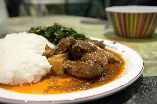 Zimbabwean food sadza nenyama green vegetables